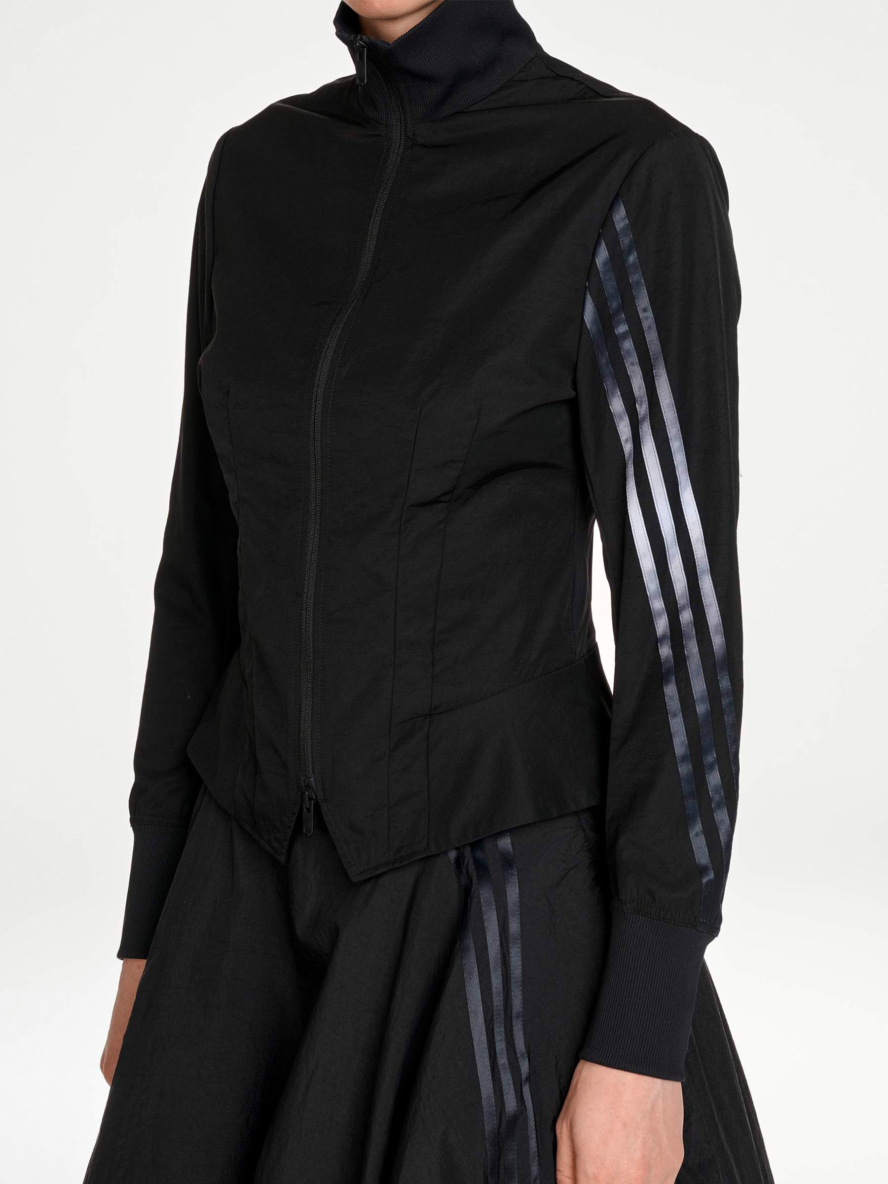 Y-3 AW26 3-Stripes Nylon Track Top in Black - detail view showing contrast 3-Stripes at sleeve
