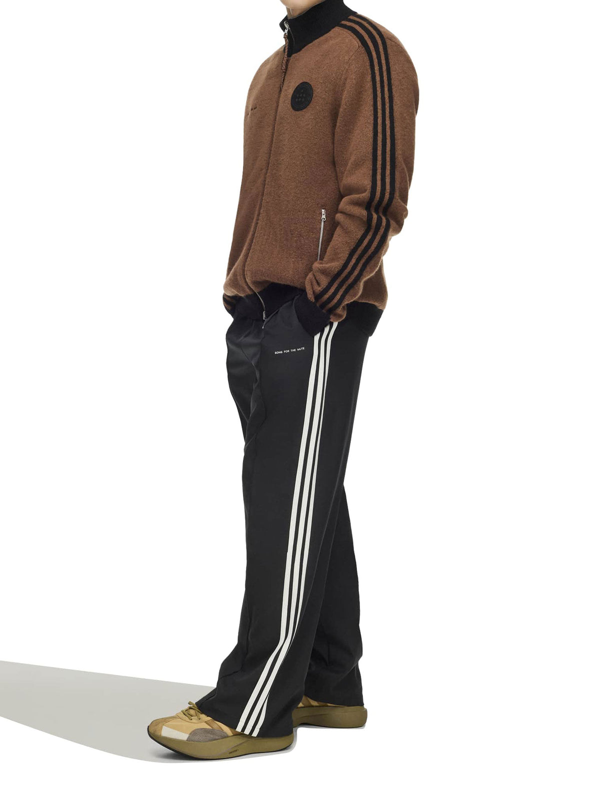 Angled side view of model wearing Adidas x Song for the Mute ADI008 Knit Jacket