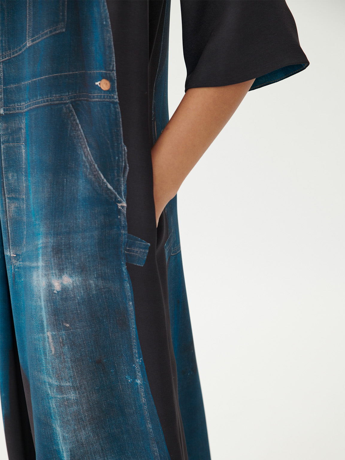 Annette Görtz Caddy overall flat lay, front view showing full trompe-l'œil vintage dungaree print in blue and black