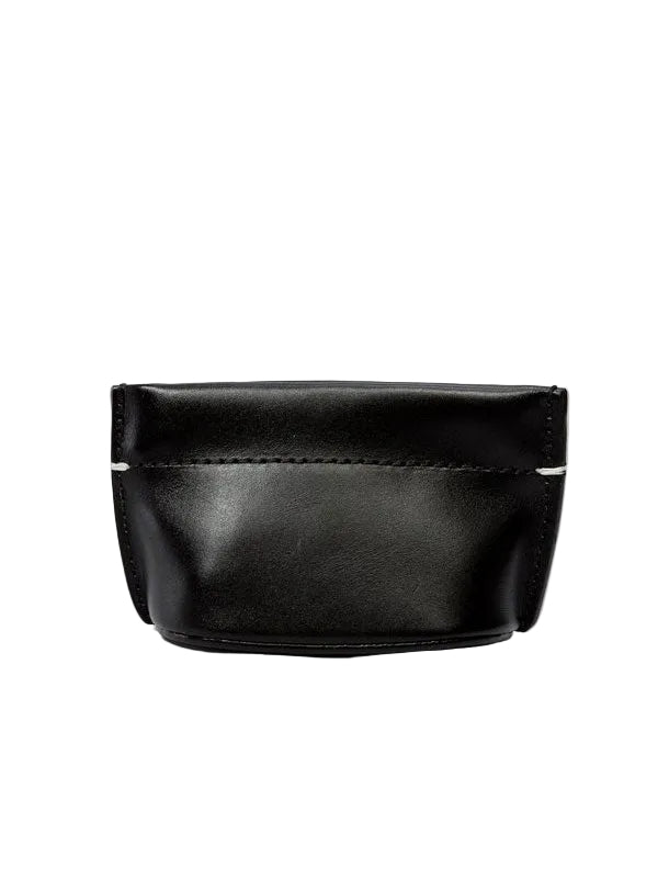 Building Block Coin Dumpling in Black leather, shown from the front with spring-action top closure and rounded base.