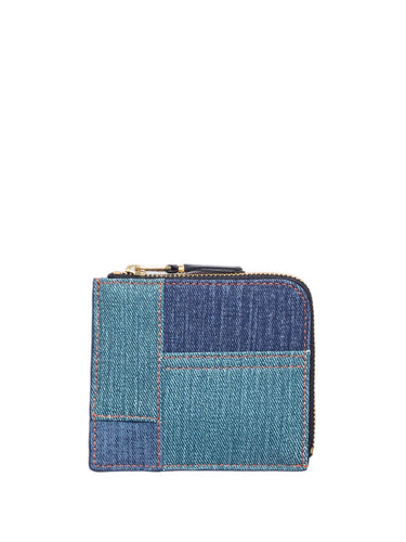 Front view of the SA3100DP Wallet from Comme des Garçons Wallet, with denim patchwork design.