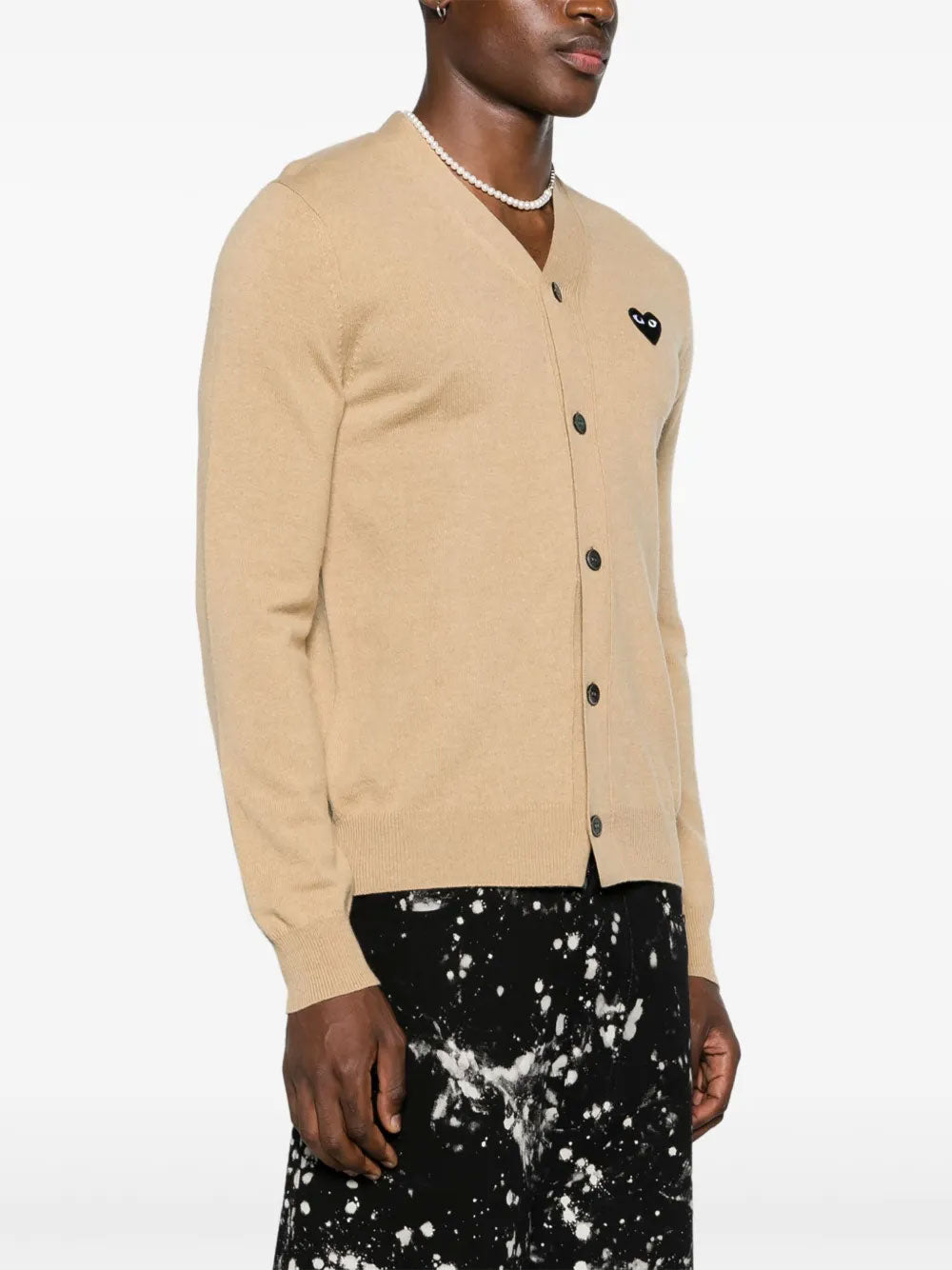 COMME des GARÇONS PLAY Unisex V-Neck Knit Cardigan Black Heart in Light Camel worn on model