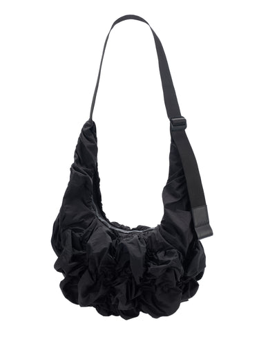 Côte&Ciel Hyco S Otra Gathered crossbody bag in black, front view, sculptural ergonomic design with ruched nylon and water-resistant zipper.
