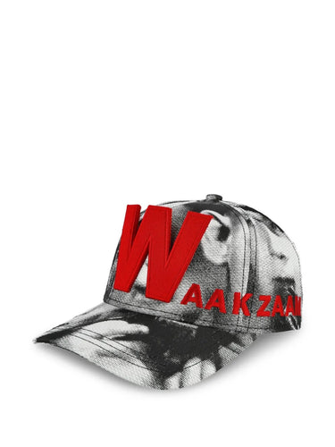 Walter Van Beirendonck Glitch Cap in Comb. I Sample - three-quarter view showing black and white face print with red logo and curved brim