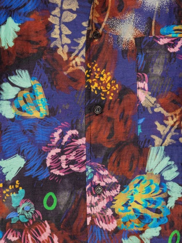 Close-up of the Artist Shirt in Space Chickens from Henrik Vibskov Spring/Summer 2026 Studio Collection, showing the vibrant colourful print, collar detail, and button fastening.