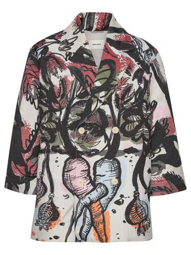 Front full-body packshot of the Care Coat in Carrots from Henrik Vibskov Spring/Summer 2026 Studio Collection, featuring multicoloured hues, an all-over carrots pattern, double-breasted closure, long sleeves, pockets, and a straight hem.