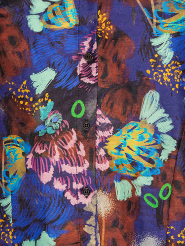 Close-up of the Case Shirt in Space Chickens from Henrik Vibskov Spring/Summer 2026 Studio Collection, highlighting the vibrant print, collar shape, button placket, and fabric details.