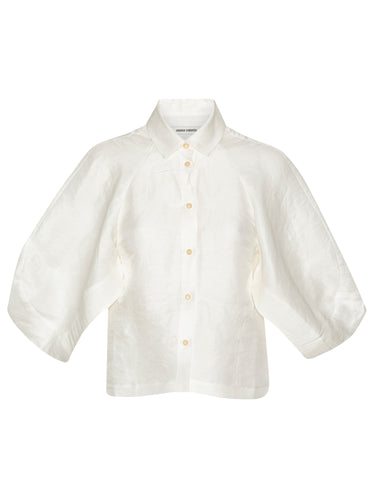 Front full-body packshot of the Case Shirt in White from Henrik Vibskov Spring/Summer 2026 Studio Collection, featuring 3/4-length raglan sleeves, a classic shirt collar, front button closure, and a straight hem.