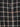 Close-up packshot of the Cover Coat in Black Checks from Henrik Vibskov Spring/Summer 2026 Studio Collection, highlighting the check fabric, collar, button placket, and detachable sleeve detailing.