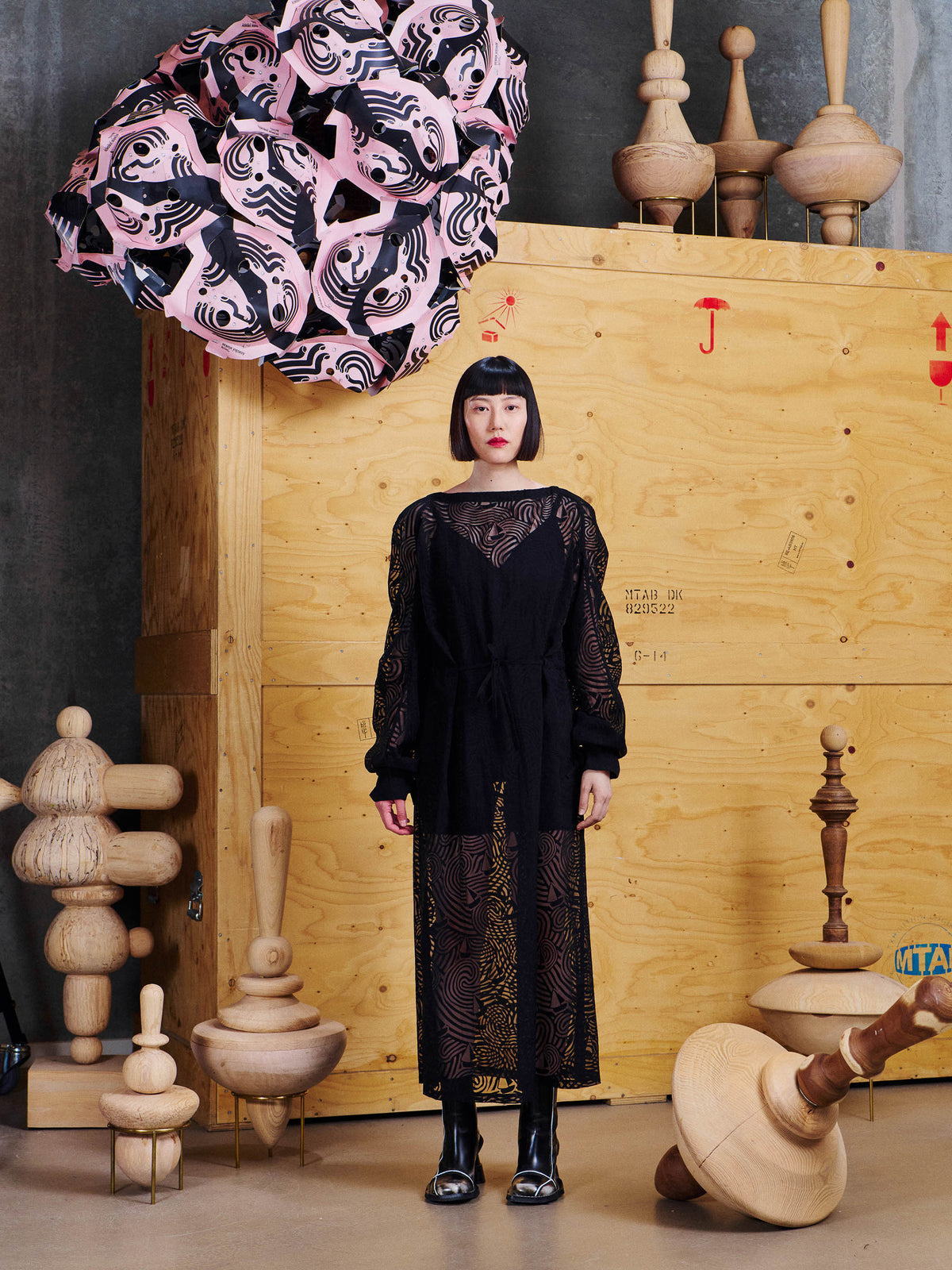 Model wearing the Henrik Vibskov Delivery Blouse in Dark Stormy Sea from the front, showing the semi-sheer patterned construction and voluminous sleeves.