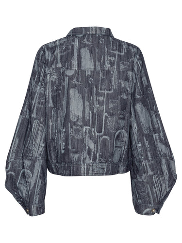 Back view of the Dial Denim Jacket in Instrument Case, showing the abstract grey-blue pattern and cropped hem.