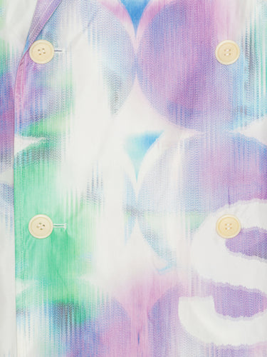 Close-up of the Dimout Long Coat in Bubble Wrap, highlighting the detailed multicolour abstract print and double-breasted button closure.