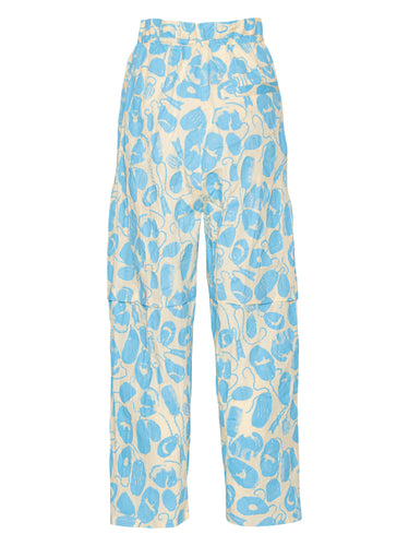 Back view of the Drawstring Pants in Ecru Amulets, showing the straight-leg silhouette and all-over blue amulets pattern.