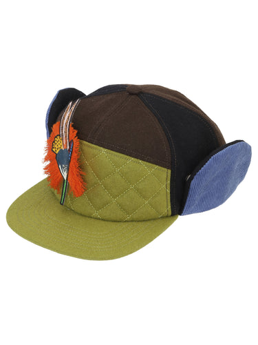 Colorful patchwork cap with a decorative element on a white background