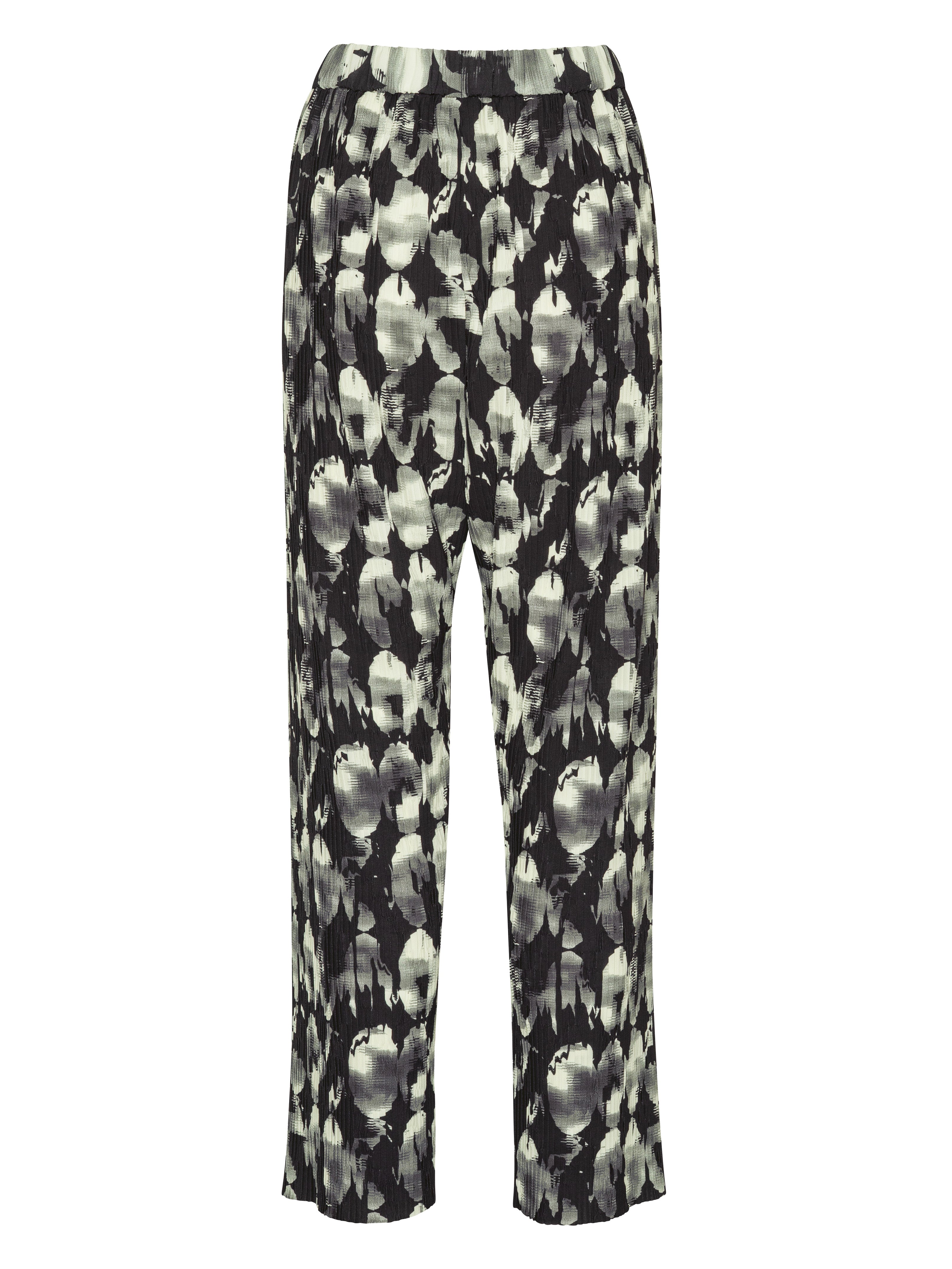 Back view of full plissé pants with the black, grey, and white bursting-eggs pattern.