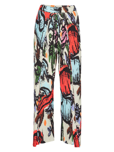 Front view of the Henrik Vibskov Fold Plissé Pants in Carrots, showing the multicolour root vegetable illustration, full plissé texture, elastic waistband with drawstring, and straight leg shape.