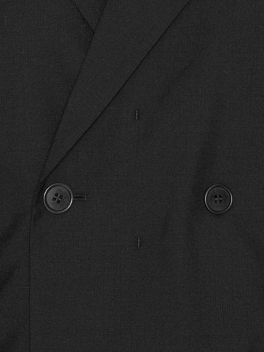 Close-up of the Henrik Vibskov Lonely Sjacket in Tropical Wool, highlighting the layered blazer construction, button details, and wool texture.