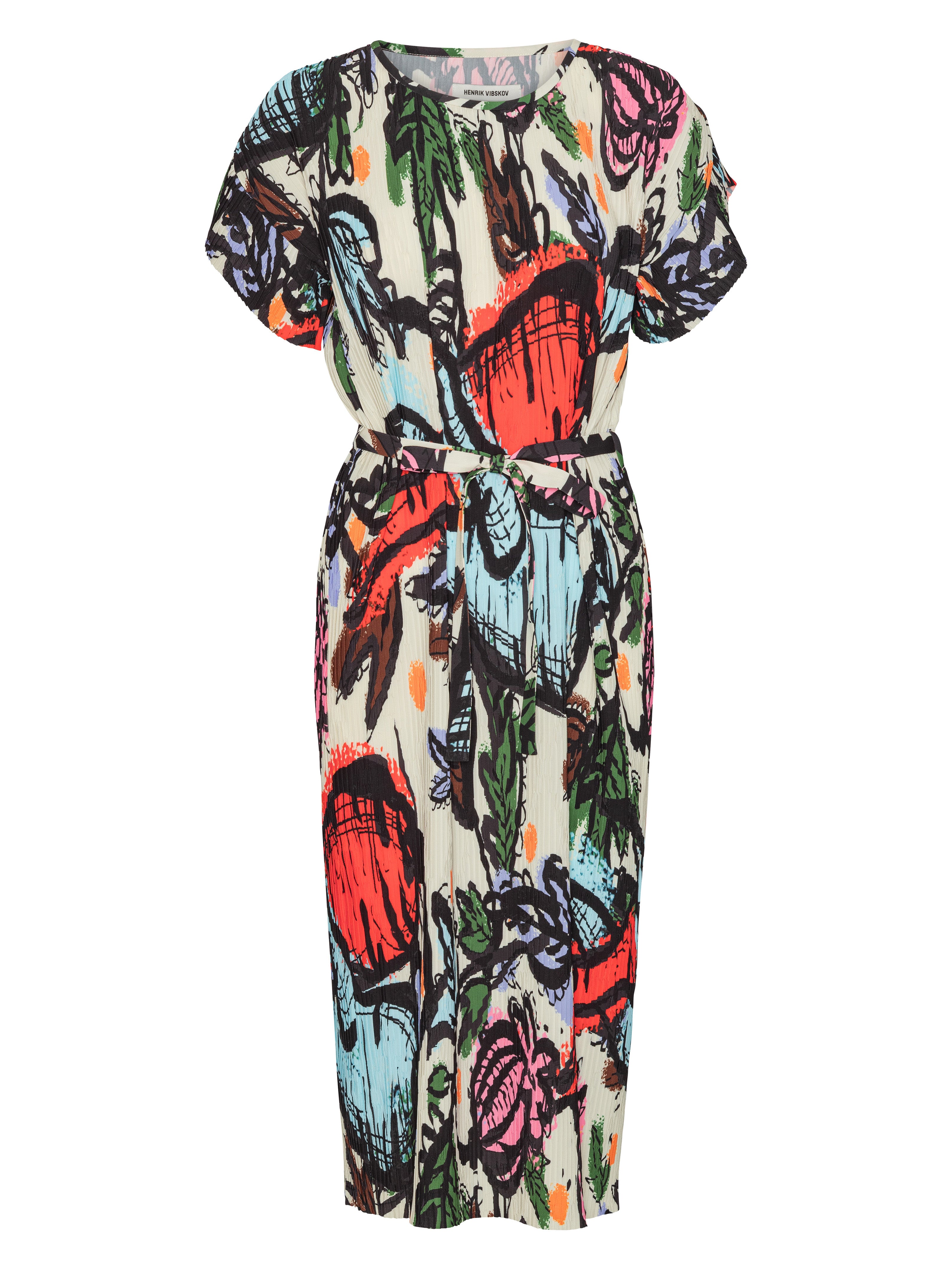 Front view of the Henrik Vibskov New Pina Plissé Dress in Carrots, showing the multicolour root-vegetable illustration, round neck, short sleeves, waist tie, full plissé texture, and straight hem.