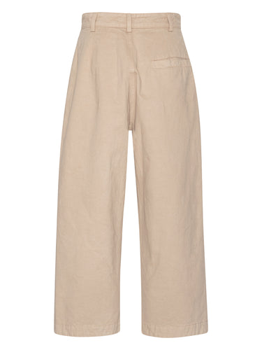 Back view of the Henrik Vibskov Open Dart Pants in sand beige, showing the clean back design, belt loops, and wide, cropped legs.