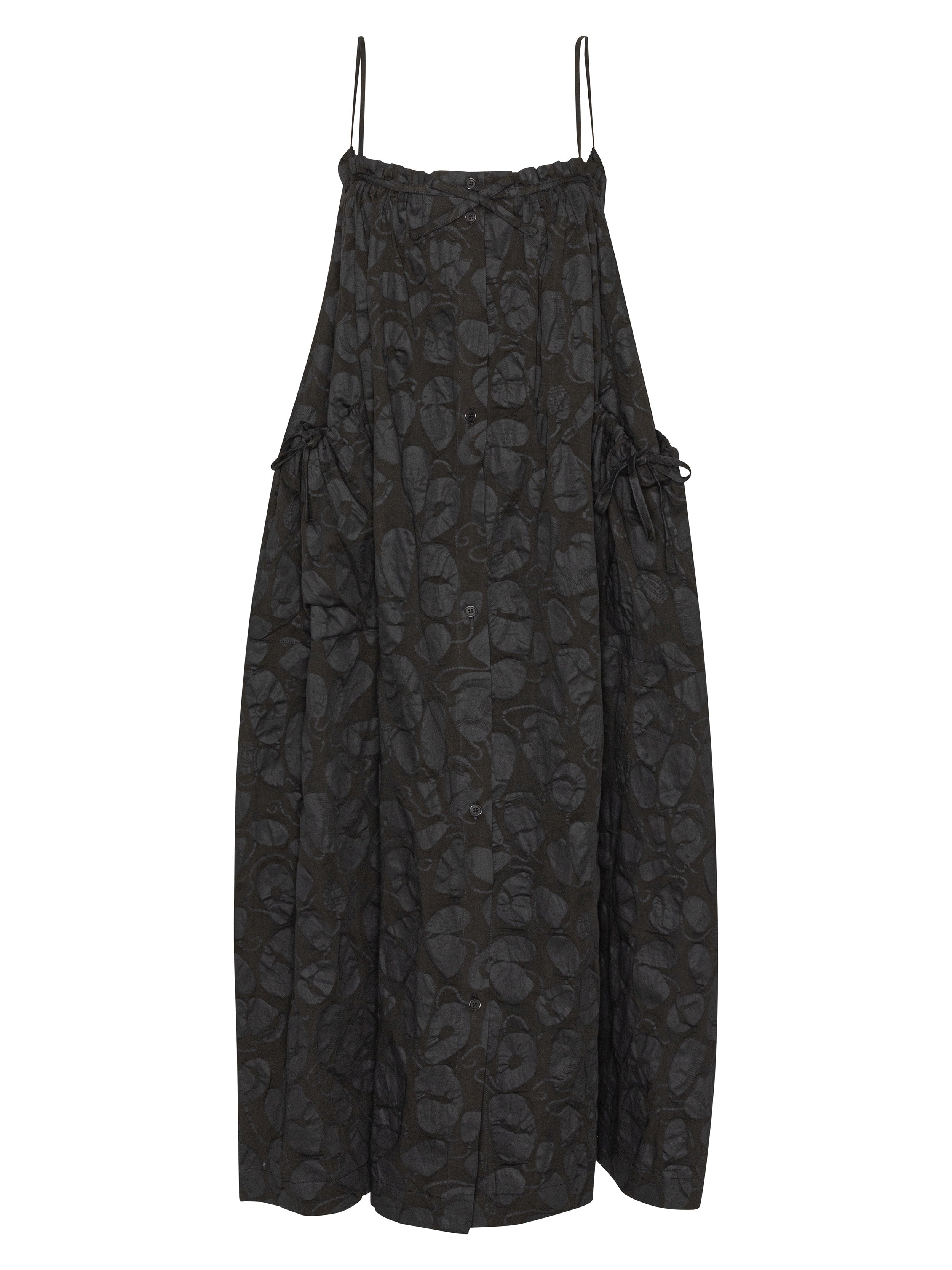 Black-on-black pattern, sleeveless dress from Henrik Vibskov on a white background.