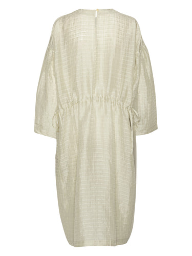 Back view of the beige-grey dress with long sleeves from Henrik Vibskov on a white background