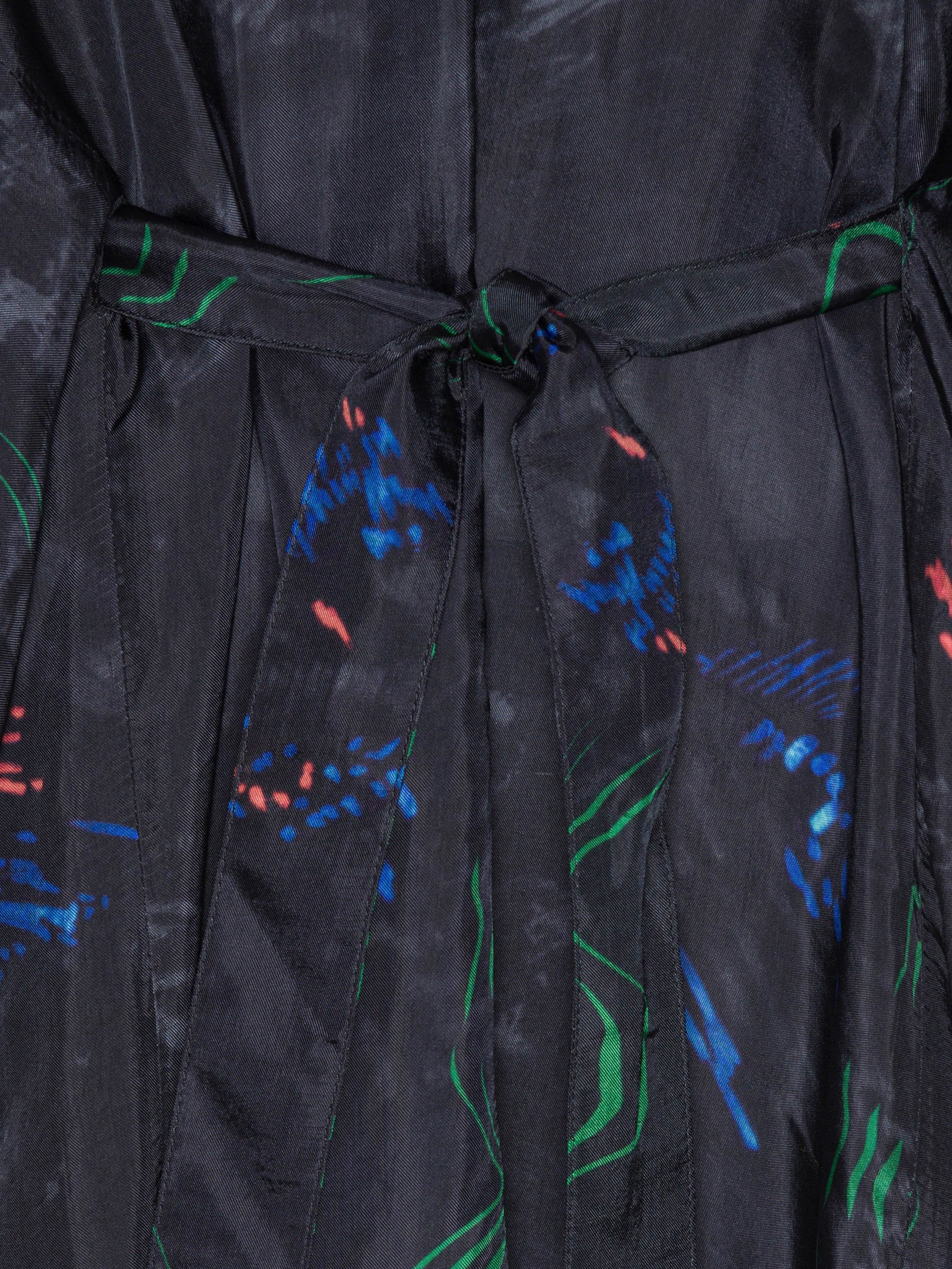 Black dress with colorful abstract patterns on a close-up view