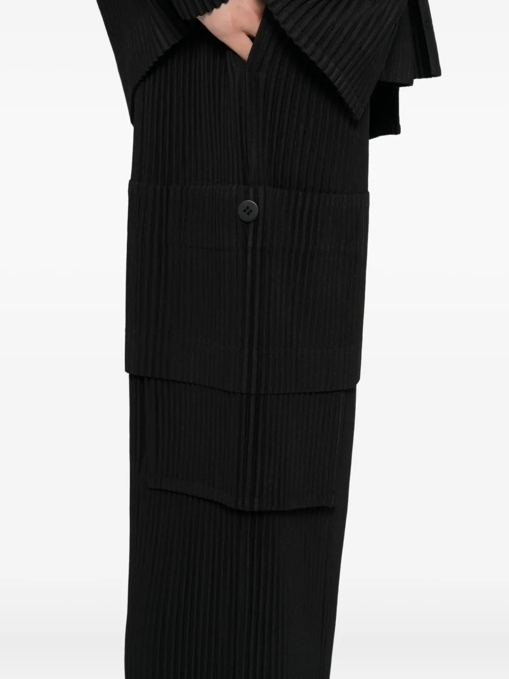 Black pleated outfit on a white background