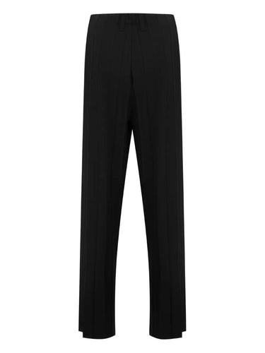 Back view of black pants with wide pleats from Homme Plissé Issey Miyake on a white background