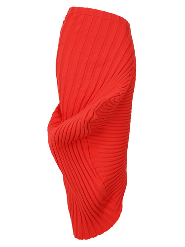 Red pleated skirt from Issey Miyake on a white background