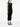Woman wearing a black dress on a white background