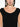 Close-up of a person wearing a black Issey Miyake dress with a plain background