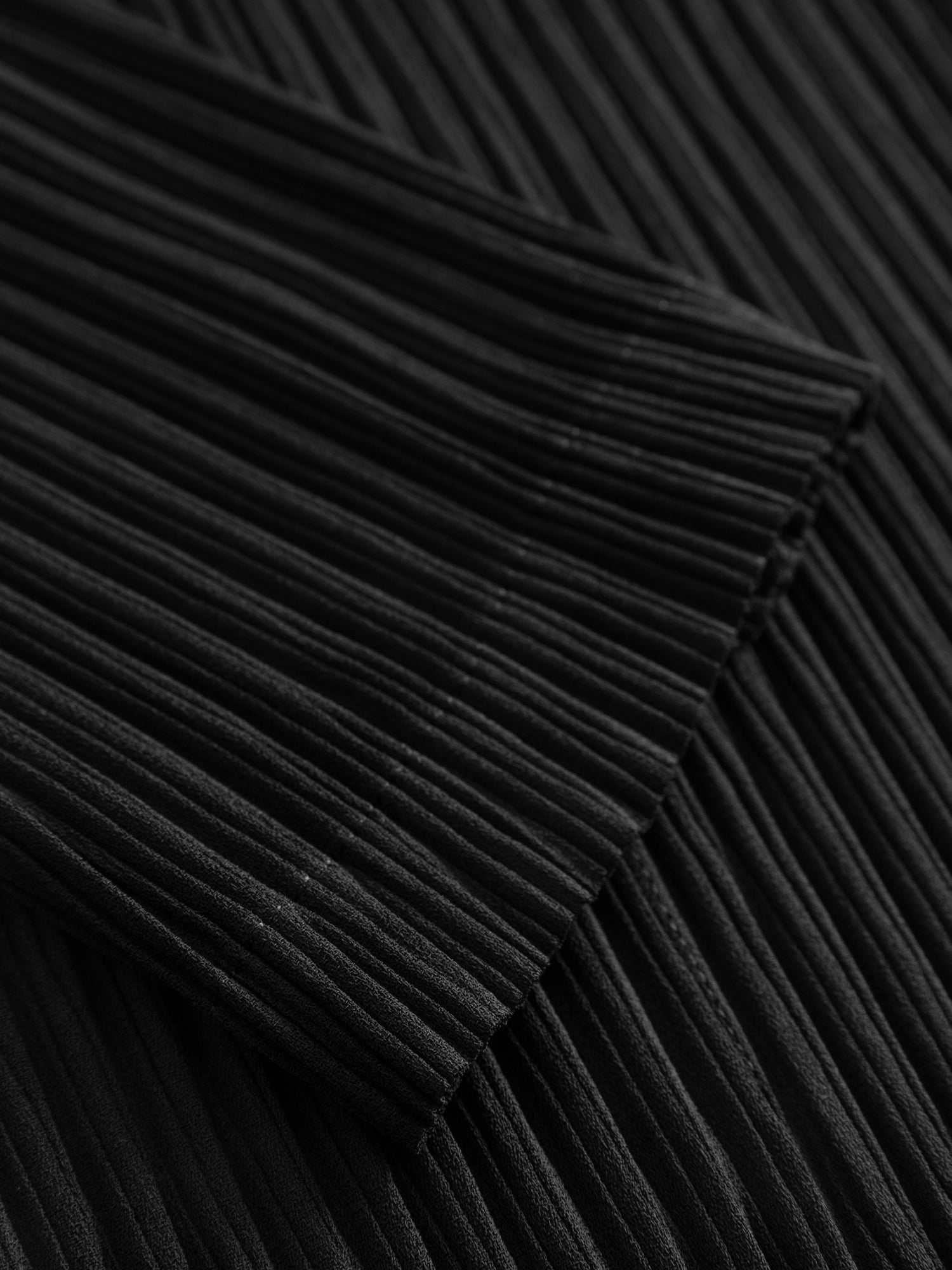 Issey Miyake Hatching pleats coat in black