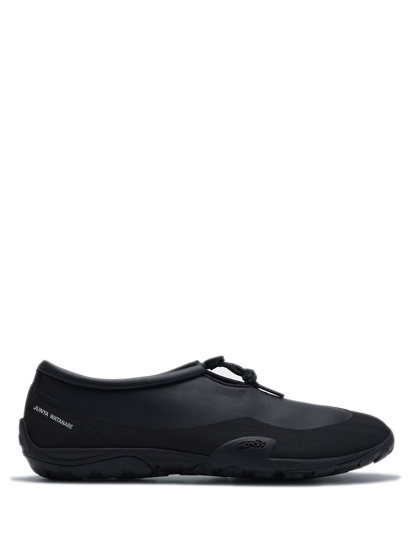 Junya Watanabe x New Balance MT10T sneakers in black, side view, unlined leather upper with toggle lace closure and Vibram® outsole