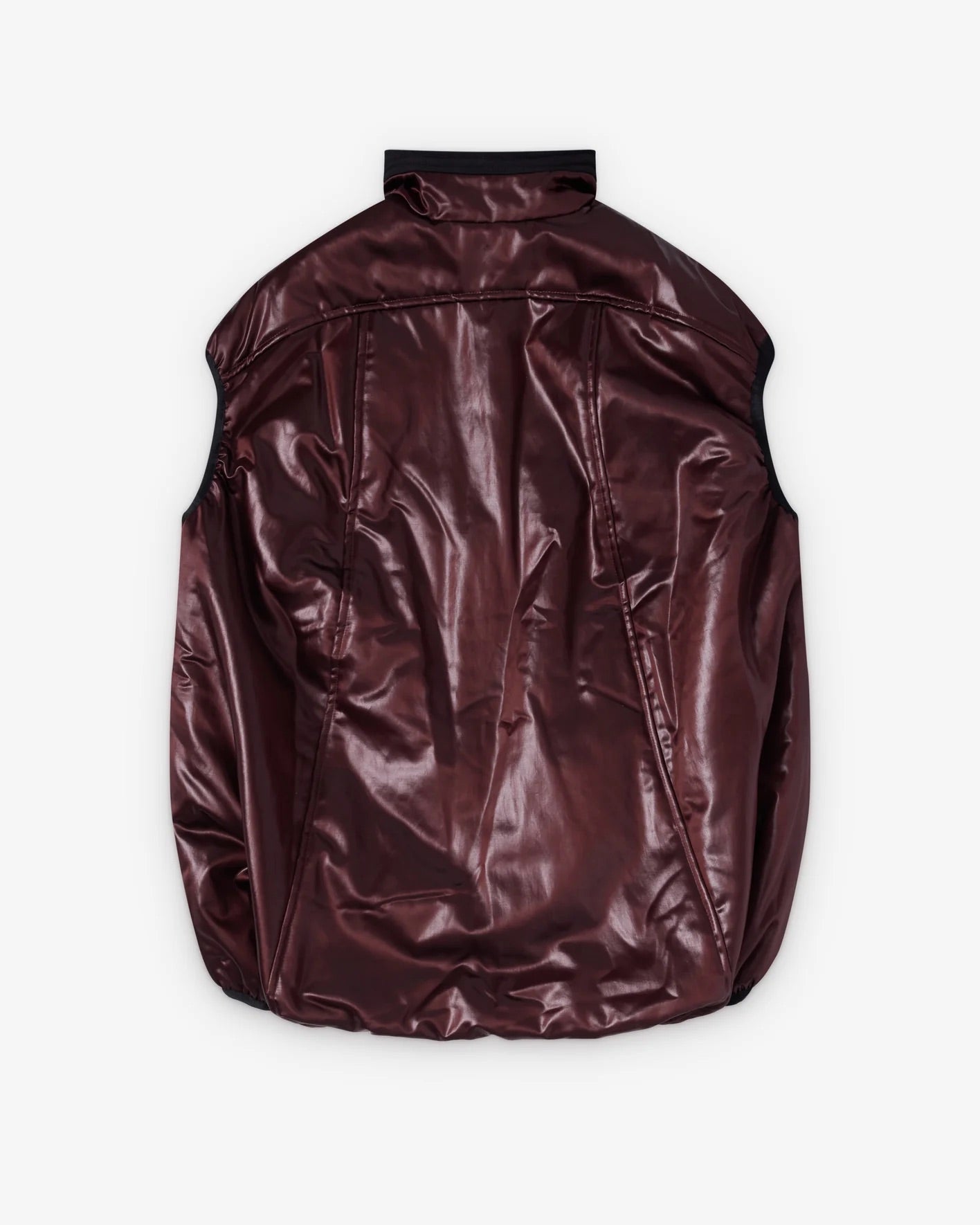 Back view of Kiko Kostadinov Auk Pullover Gilet in Burnt Umber showing sleeveless silhouette, glossy technical fabric and black trim detailing