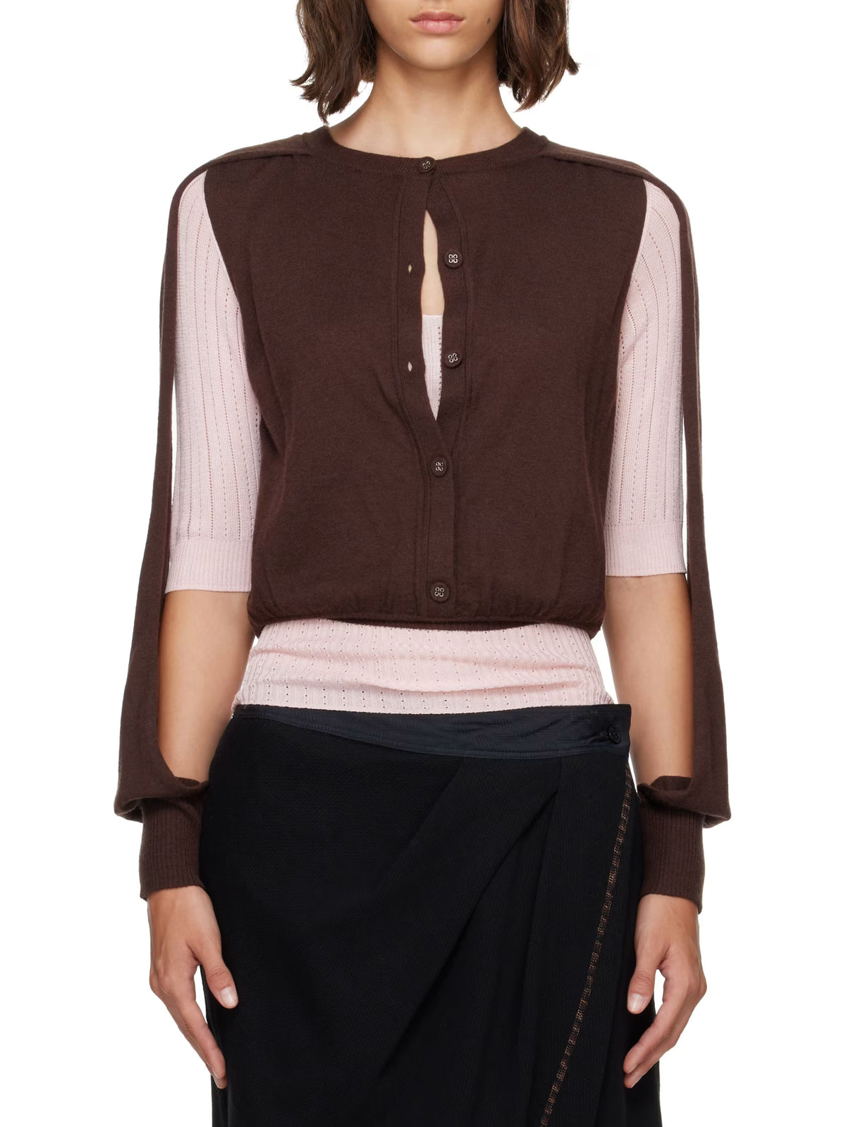 Kiko Kostadinov Corella Double Sleeve Jumper in Mahogany worn on a model, showing the layered knit structure, contrasting silk base, open sleeve construction and slim fitted shape.