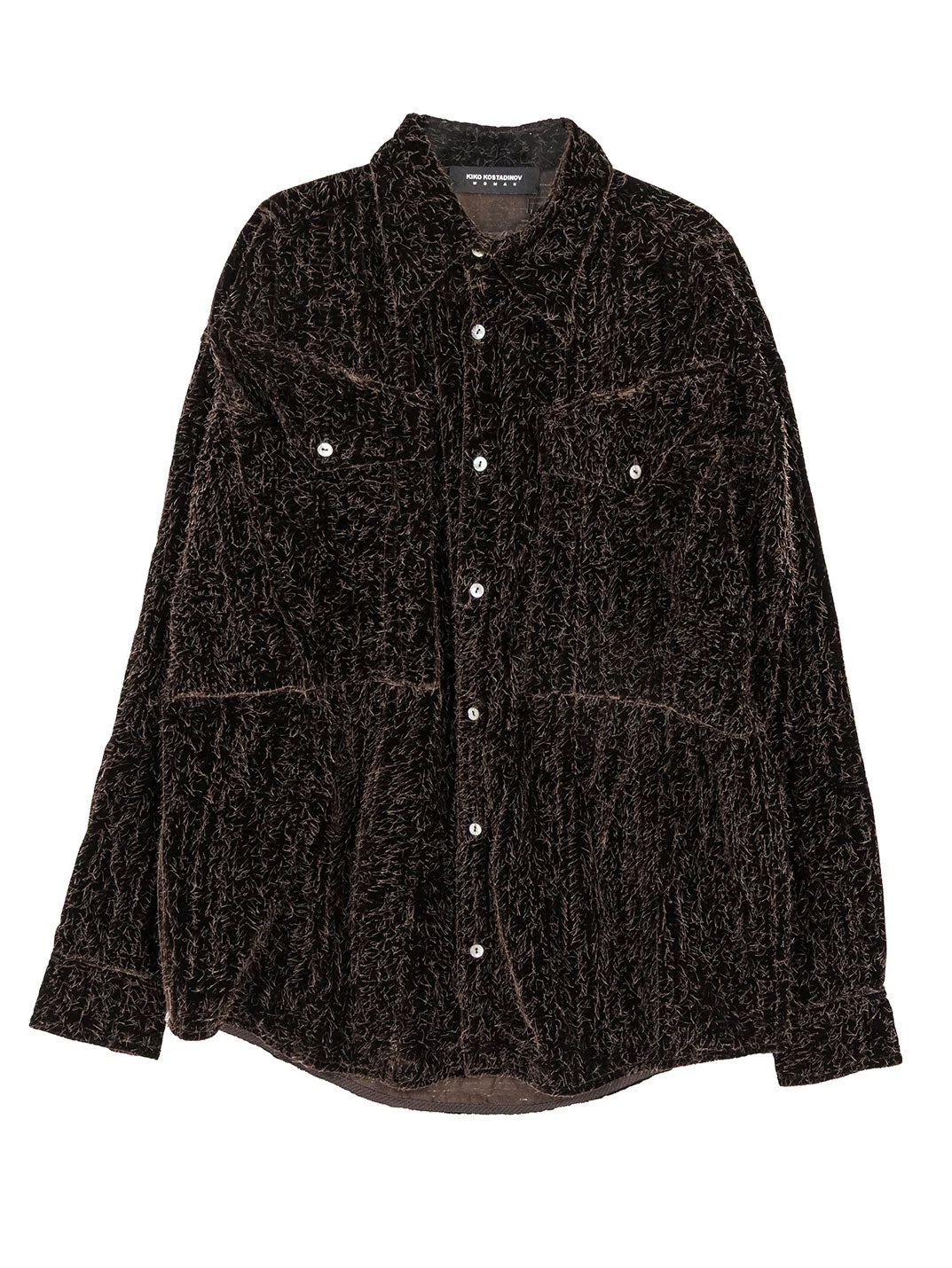 Kiko Kostadinov Weka Shirt in Hickory shown from the front, featuring a dark textured surface, pointed collar, centre button closure, chest patch pockets, long sleeves and a relaxed curved hem.
