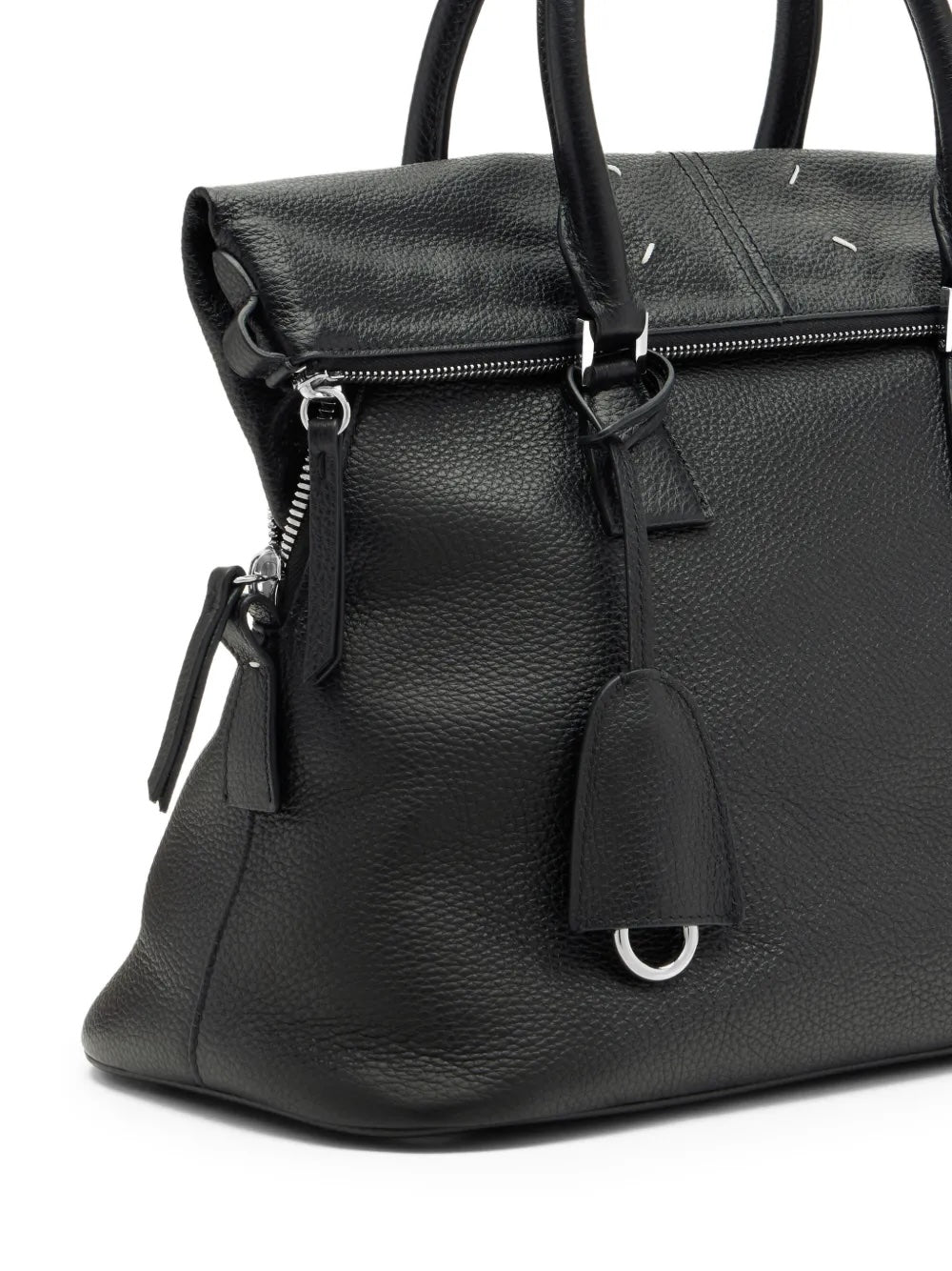Maison Margiela 5AC Soft Medium in black, close-up of four-stitch logo, leather tassel pulls and silver-tone zip hardware