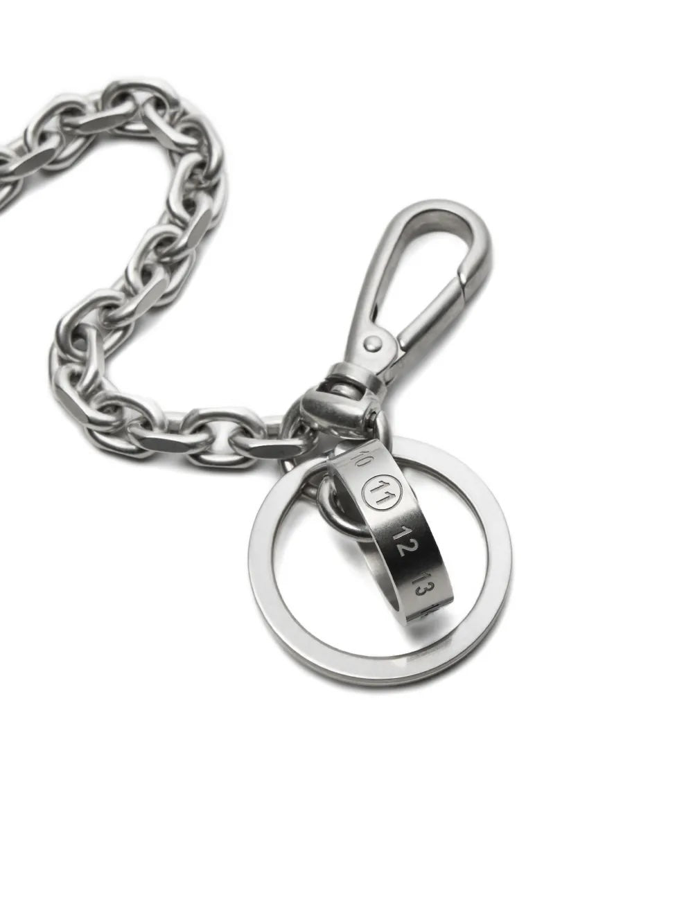 Close-up of Maison Margiela Numeric Bag Chain showing cylindrical charm engraved with house numeric signature and swivel clasp