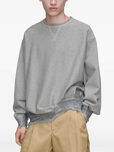 Maison Margiela Sweatshirt in grey melange, front close-up, crew neck and crinkled fabric layer at hem