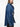 Maison Margiela V-Neck Long-Sleeved Shirt in medium blue - side view, curved hem with side vent and snap button fastening detail