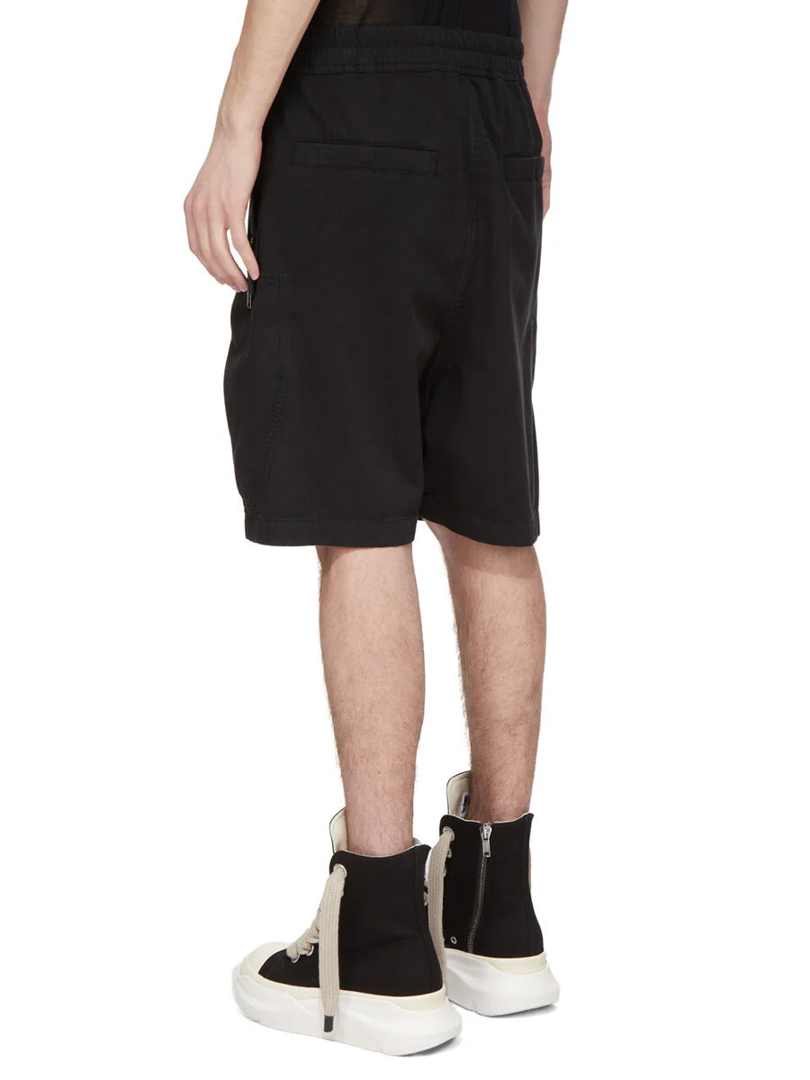 Rick Owens DRKSHDW Bauhaus Drawstring Shorts in Black worn from the back, showing the relaxed fit, elasticated waistband and rear welt pockets.