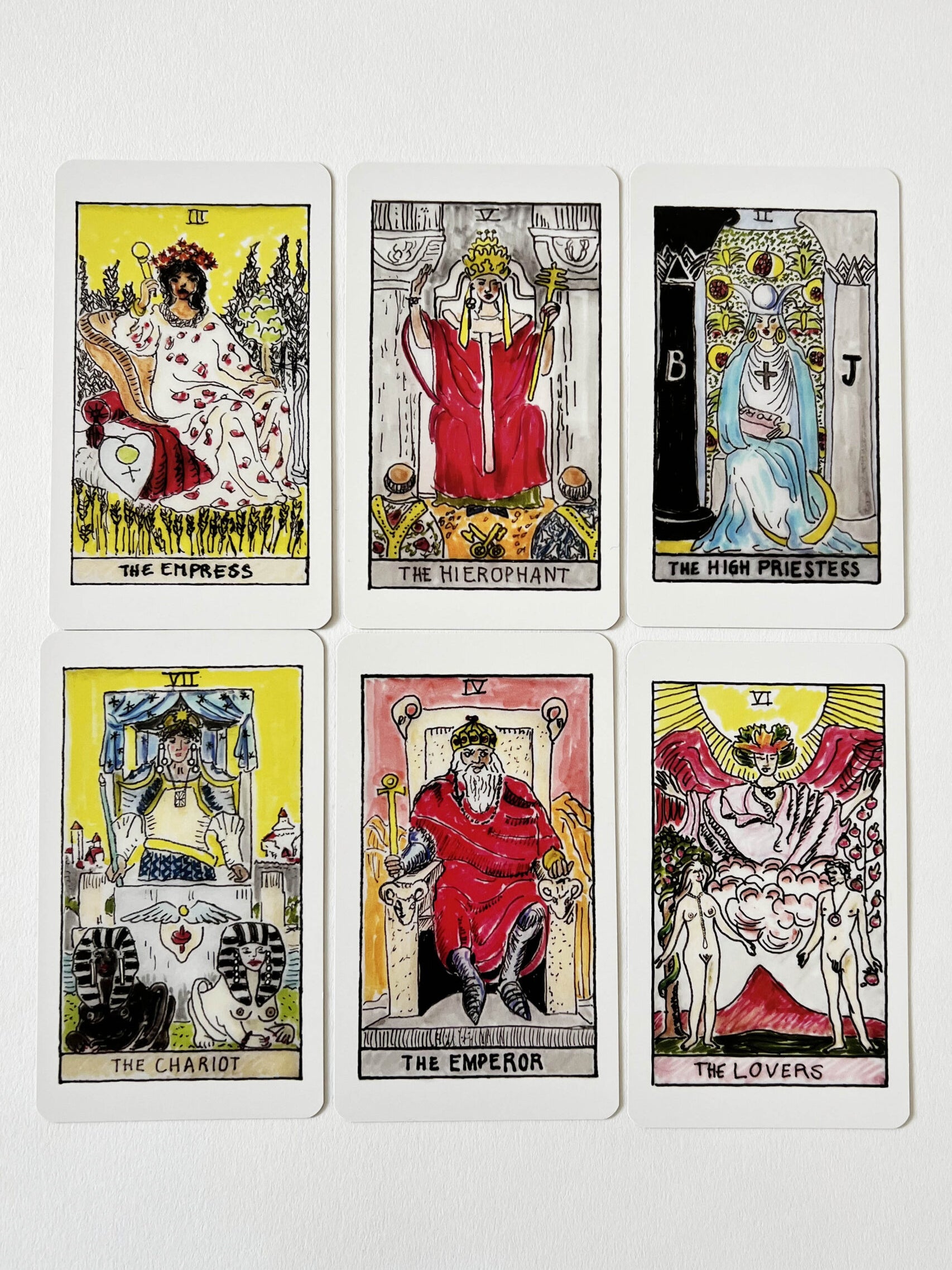 Packshot of multiple Tarot Cards from the Saskia Diez Spring Summer 2026 collection laid out in a spread, displaying various card illustrations.