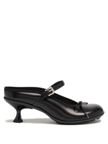 Black heeled mules with grip soles from Simone Rocha on a white background