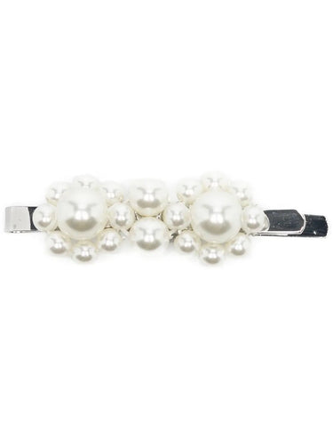Pearl hair clip on a white background