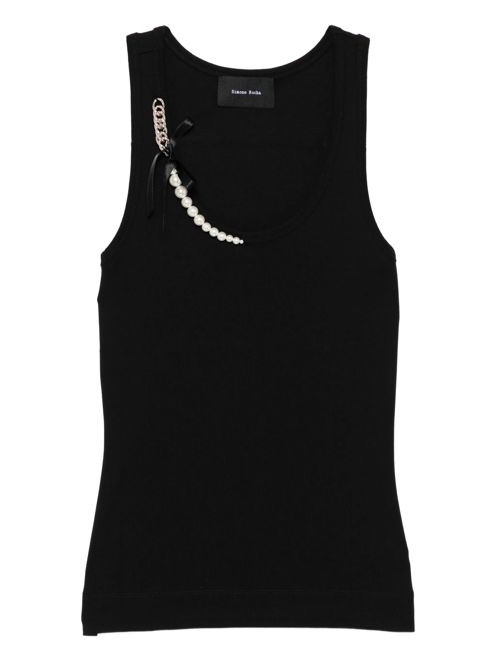 Black tank top with decorative bow and pearls on a white background