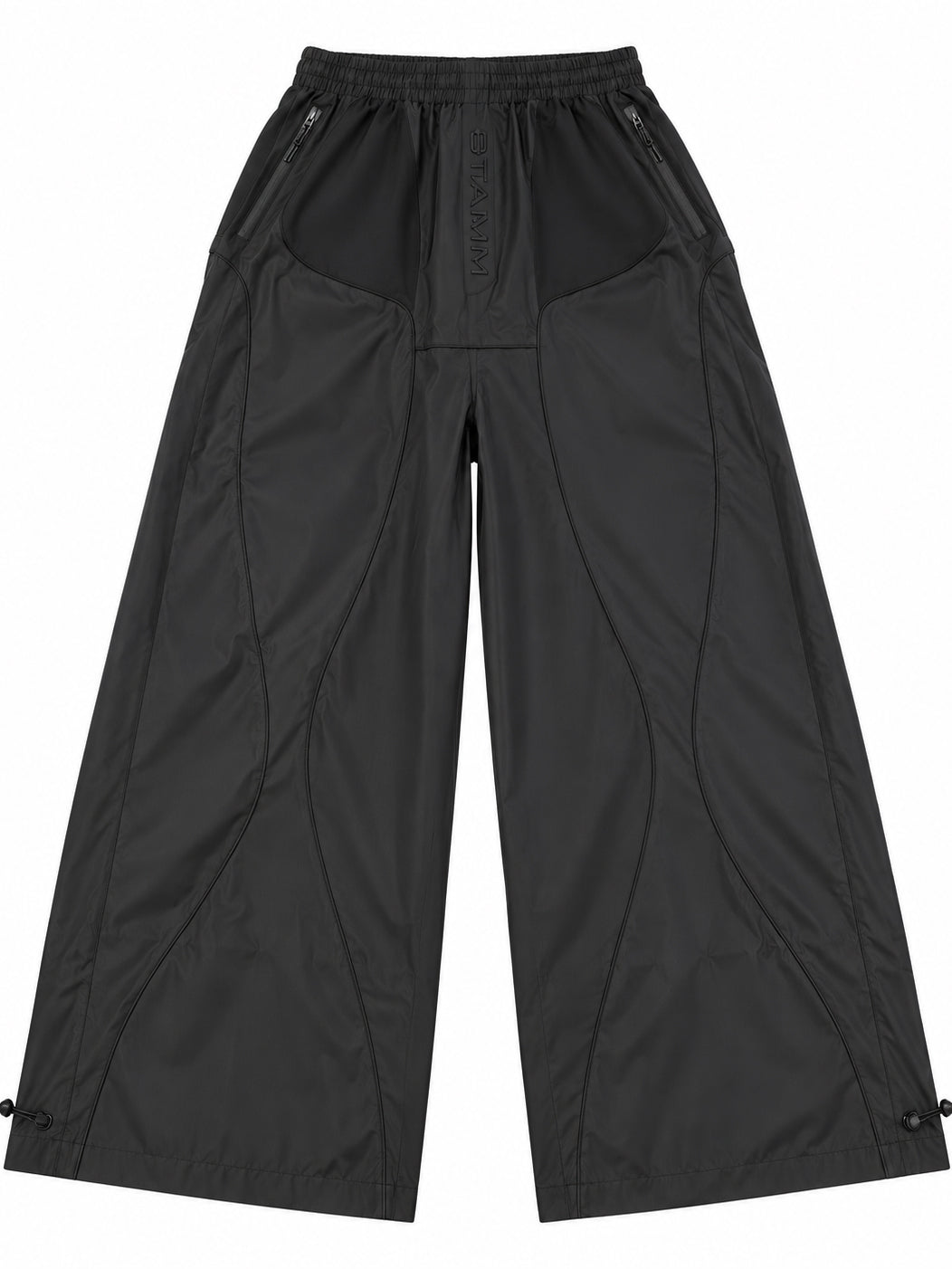 Model wearing Stamm Exchange Center Black Pants in Black with the matching Center Black Jacket, showing the wide-leg silhouette and technical styling.