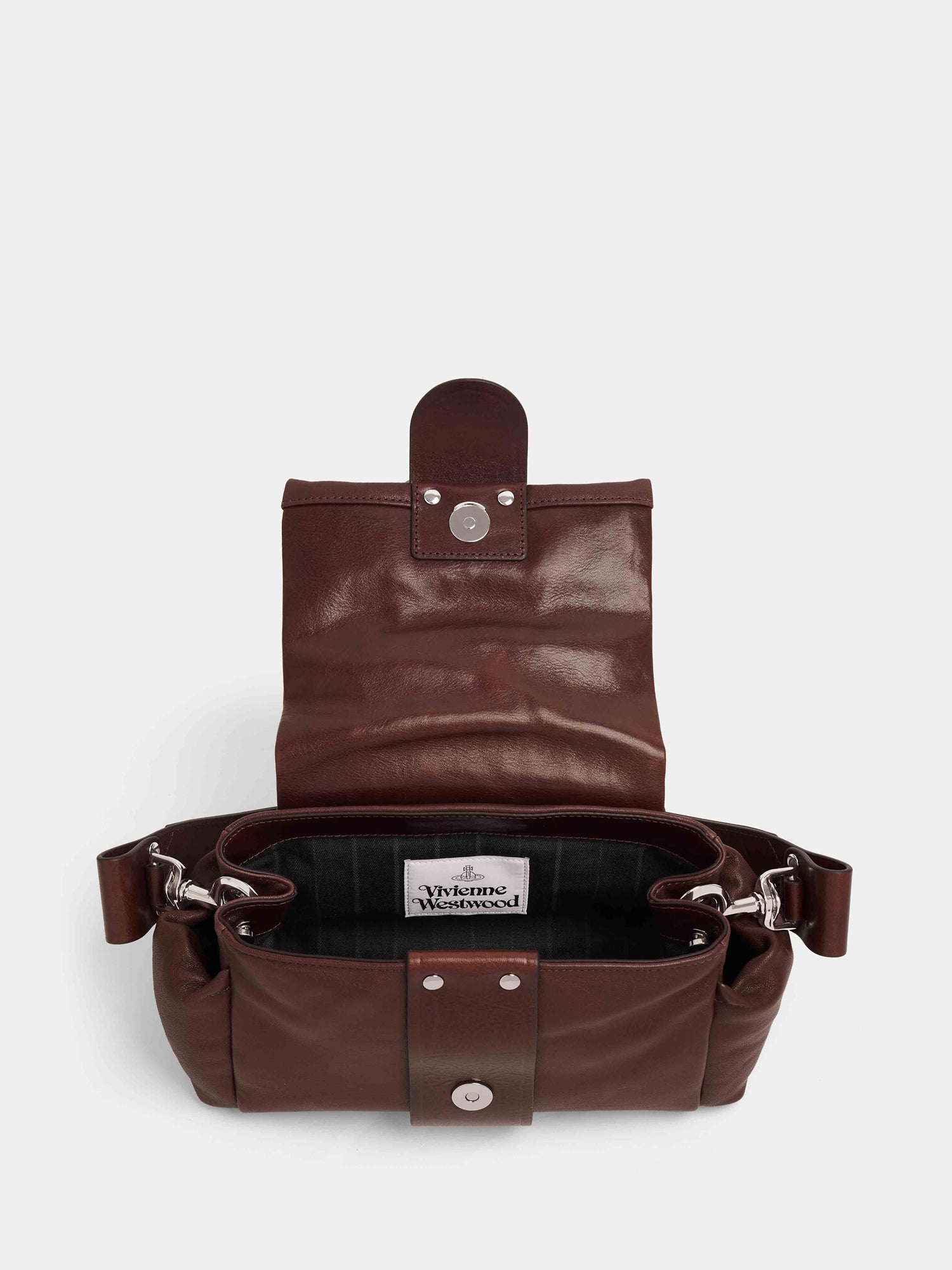 Vivienne Westwood Hazel Treasure Handbag in chestnut brown leather shown open with Broken Pinstripe lining and internal compartment