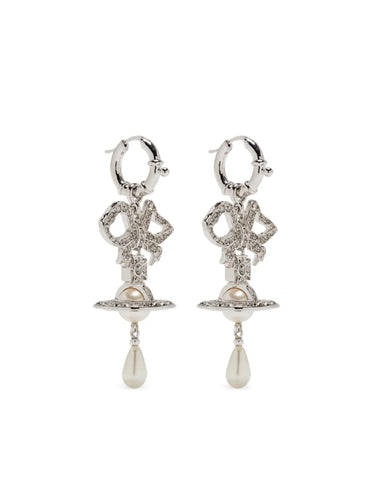 Pair of silver earrings with bow and orb designs and pearl drops from Vivienne Westwood on a white background