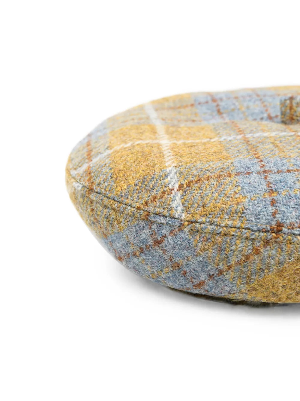 Vivienne Westwood Beret Harris Tweed in Multi, close-up side view showing the textured Harris Tweed tartan and rounded beret shape.