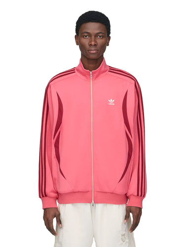 Model wearing the Wales Bonner x Adidas Track Top in Craft Pink pink track jacket with burgundy three-stripe detail and zip closure, front view – Wales Bonner x Adidas SS26